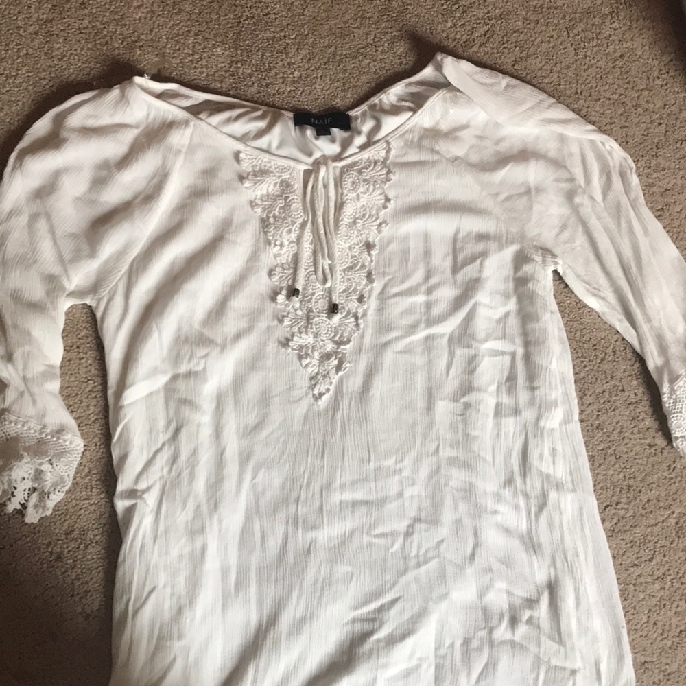 White dress with macrame detailing